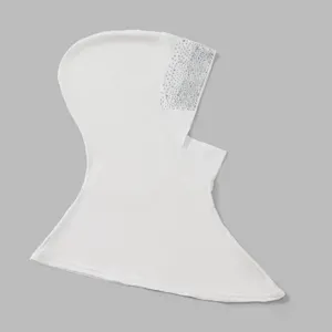 Close-up detail of white rhinestone embellished hijab scarf, soft fabric, elegant and stylish.