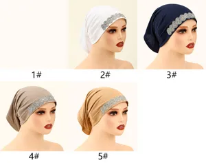 Close-up detail showing the exquisite rhinestone trim and soft fabric of the women tube cap.