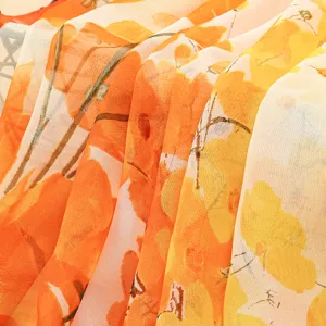 Orange floral printed lightweight silk scarf shawl for women summer fashion accessory.