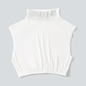 Detailed close-up view of the white mock neck false collar featuring sparkling rhinestone details.