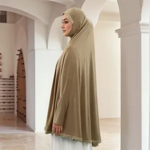 Detailed view of the khaki modest hijab with delicate lace trim, showcasing elegant ethnic pullover design.