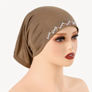 Brown mercerized cotton under cap with shiny rhinestone zigzag design for women comfortable wear.