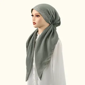 Close-up view of the elegant gray rhinestone hijab cap, highlighting delicate crystal details.