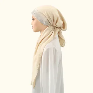 Detail view of beige cotton linen hijab cap with sparkling rhinestones side profile