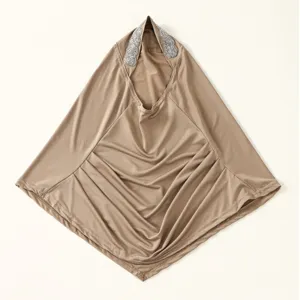 Detailed view of the elegant rhinestone pleated polyester women hijab headscarf in khaki.
