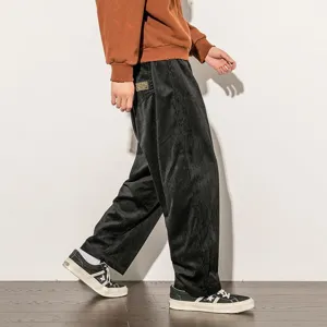 Pantaloni casual da uomo in velluto a coste nero dritti e larghi per autunno e inverno quotidiano.