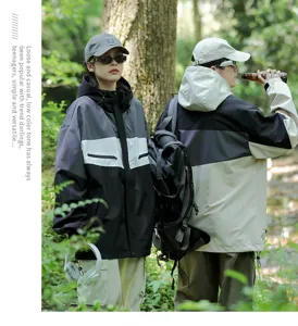 Giacca antivento impermeabile da esterno autunnale per uomo e donna, design elegante.