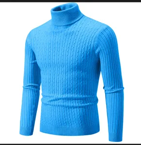 Close-up detail of the bright blue men's turtleneck cable knit sweater texture and ribbed collar.
