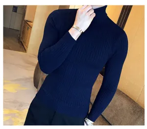 Men's dark blue cable knit turtleneck sweater close-up, soft textured fabric and slim fit design.