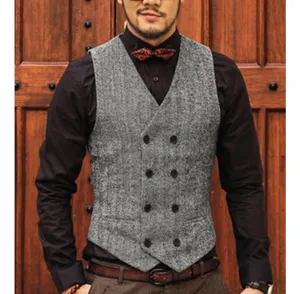 Close-up view of men's gray herringbone double-breasted vest detail, stylish daily casual wear.