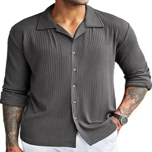 Detailed close-up of men's grey long sleeve ribbed button-down casual shirt top.