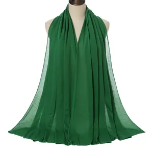 Detailed view of the solid green stretch cotton jersey scarf, soft and breathable hijab.