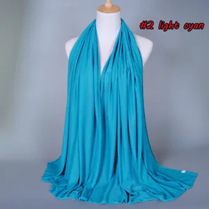 Light cyan stretch mercerized cotton scarf fabric detail, soft breathable texture close up.