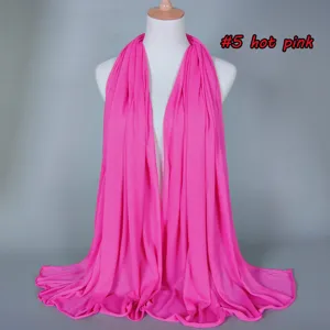 Solid color modal cotton women scarf detail shot, elegant drape and breathable fabric style.