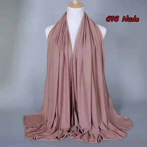 Detail view of solid color mercerized cotton jersey hijab scarf in nude, elastic and breathable.