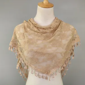 Chic women's beige lace triangle scarf with delicate hollow-out floral patterns and tassel hem.