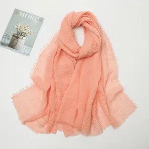 Peach pink cotton linen pleated scarf with fringe, stylish crinkle shawl for women daily wear.