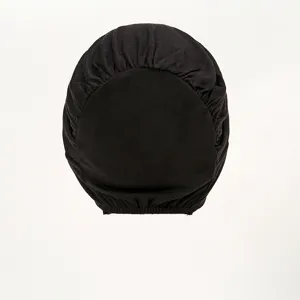Close-up detail of the black modal under cap showing the elastic gathered texture clearly.