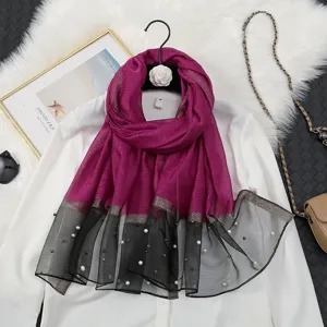 Detailed view of women gradient organza scarf with faux pearls, elegant sun protection shawl.