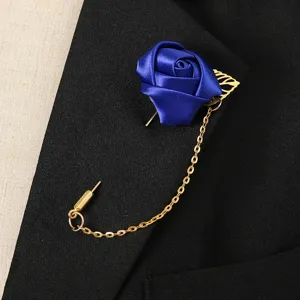 Blue satin rose lapel pin with gold chain brooch for suit and dress decoration detail
