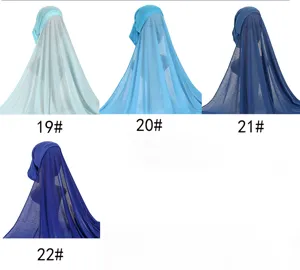 Close-up detail of solid color polyester hijab scarf set showcasing multiple blue shades.