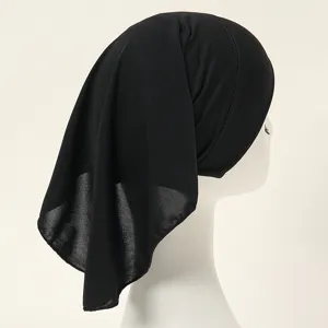 Black solid color straight cut inner cap, minimalist design, comfortable fabric detail view.