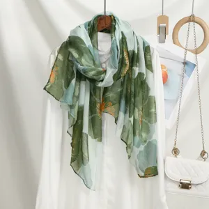 Green floral print women long scarf, lightweight sheer fabric elegant fashion accessory.