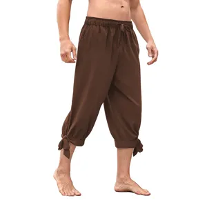 Detail view of men's medieval renaissance drawstring cropped pants, loose fit cuff tie design.