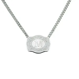 Silver-tone necklace featuring an embossed belt buckle pendant with the initial letter M