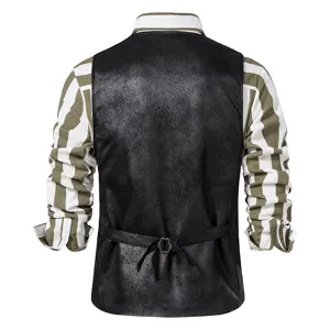 Men's vintage black faux suede vest waistcoat layered with striped long sleeve shirt detail.