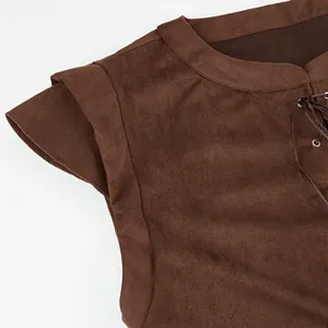Renaissance pirate faux suede vest detail showing textured brown fabric and lace-up front.