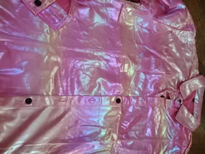 Men long sleeve shiny disco shirt detail, metallic pink button up top fabric view