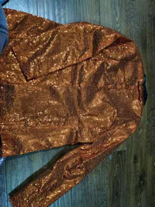 Orange sequin blazer jacket for men, sparkling stage performance formal coat for party event.