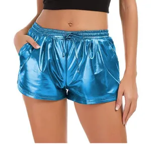 Close up view of shiny metallic PU leather shorts, elastic drawstring waist and side pockets.