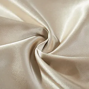 Silk satin fabric detail shot, ultra-smooth and soft texture for comfortable casual shorts.