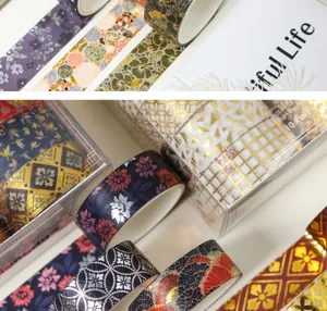 Dekorative Washi-Tapes-Set mit Goldfolienmustern, ideal für Tagebücher und DIY Basteln.