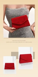 Red suede evening bag detail showing soft texture, elegant flap and metal chain.