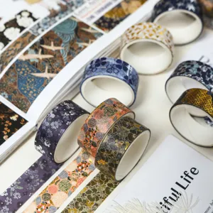 Dekoratives Washi Tape Set im Vintage Stil mit Goldfolie für Tagebuch und Basteln.