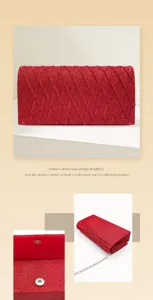 Red glitter evening clutch bag detail showing diamond lattice texture, snap closure and chain.