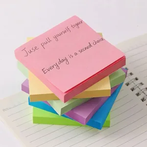 Stack of vibrant multi-color square sticky notes for office and school supplies
