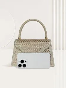Elegant rhinestone evening bag with sparkling crystals and chic handle for weddings and parties.