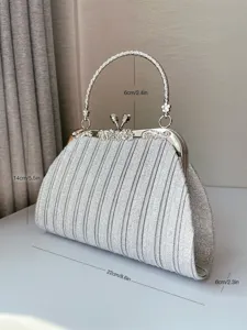 Silver pleated evening clutch bag with sparkling sequins and metal top handle for women.