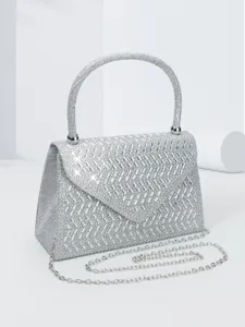 Silver rhinestone evening bag with top handle and chain strap for wedding party and prom events.