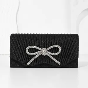 Black glitter evening clutch bag with sparkling rhinestone bow for women party wedding.