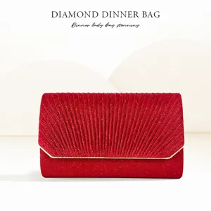 Red glitter pleated evening clutch bag with gold metallic frame for party and dinner.
