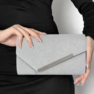 Elegant silver glitter evening handbag with metal strip, stylish magnetic flap clutch bag.