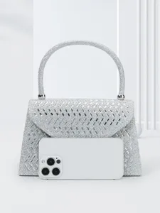 Silver rhinestone evening bag detail, sparkling crystal handbag for party and wedding.