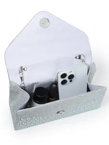 Silver rhinestone evening bag detail view, elegant clutch purse with chain strap for wedding party.
