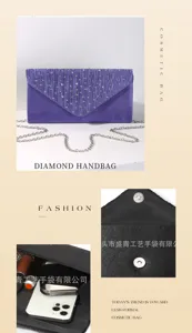 Elegant pleated rhinestone evening clutch bag detail showing chain strap and interior space.