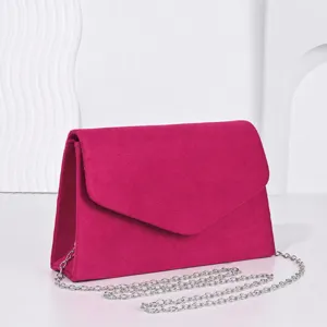 Elegant pink velvet evening bag for women, chic solid color clutch with metal chain strap.